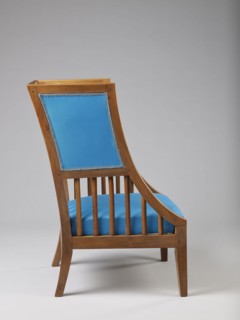 Armchair Berzera, armchair with a slender backrest and sides equal in height, arching upwards and