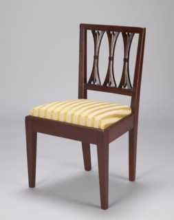Chair, classicism style. Classicist chair with a trapezoidal padded seat insert cushion and a