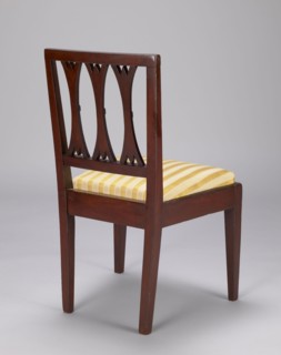 Chair, classicism style. Classicist chair with a trapezoidal padded seat insert cushion and