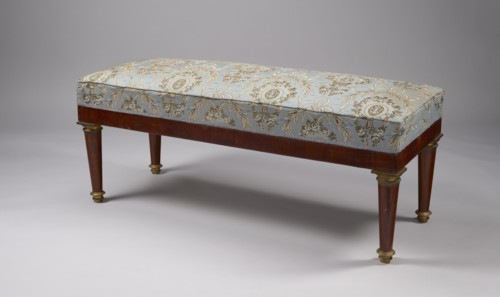 Banquette, Empire style, early 19th century. Rectangular mahogany banquette, upholstered, supported