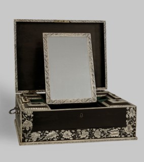 Travel dressing table, Baroque style, ca. 1750, Vizagapatam, India. Ebony cuboid with a lifting lid