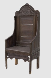 Armchair, geometric ornaments, plant decoration. Armchair with a high rectangular backrest, equally