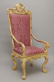 Travel armchair, late Baroque type, carved and gilded, with a high flat backrest, cabriole legs