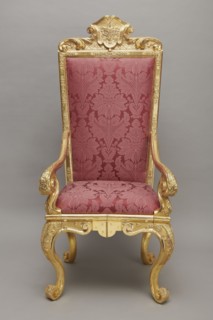Travel armchair, late Baroque type, carved and gilded, with a high flat backrest, on cabriole legs