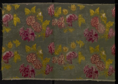 Fragment of patterned silk fabric, plant motifs in a naturalistic style, brocaded with tied weft
