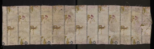 Fabric fragment: pale pink silk brocaded with colorful and silver threads. Brocade threads: light