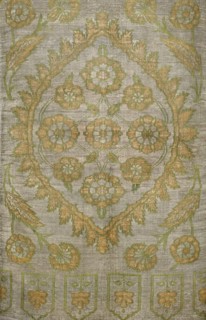 Fabric slab, fragments of a larger textile object, silk fabric. In the center, a large palmette