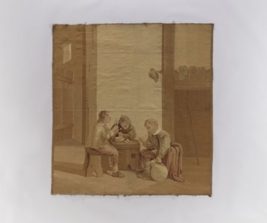 Figural tapestry. Genre scene in an inn: inside a farm building or stable, three men sit at a table