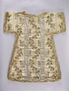 Dalmatic, origin, 18th century, France; liturgical vestment fabric decorated with flowers, leaves,