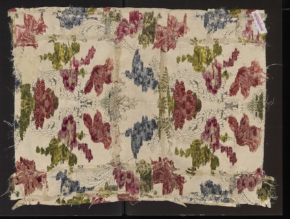 Fabric fragment, silk fabric fragment, patterned with fanciful floral sprigs entwined with silver