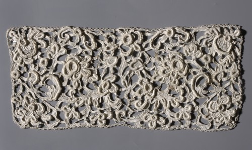 Lace fragment, Plant ornaments and plant tendril; contours of flowers and leaves executed in relief