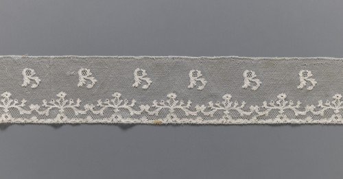 Lace fragment, plant ornaments, Louis XVI style, Malines Mechelen lace. At the lower edge there are