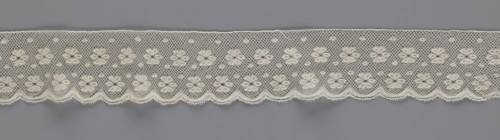 Lace fragment, tied in the form of a belt with one-sided arched serrations. Regular ornament: