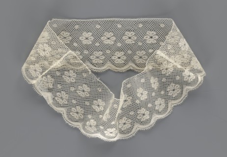Fragment of lace, section of a belt sewn into a closed circle with one-sided arched serrations.