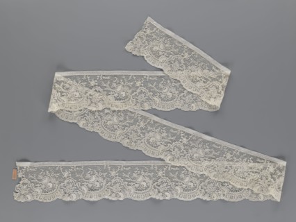 Lace fragment, lace, floral ornaments with rocaille motifs, over-stylized fan-shaped ribbons with