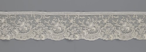 Lace fragment, lace, floral ornaments with rocaille motifs, over-stylized fan-shaped ribbons with
