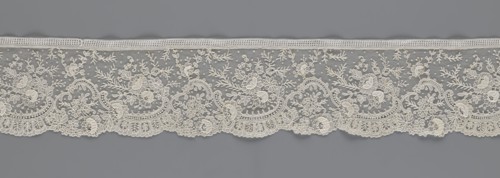 Lace fragment, Lace with floral ornaments, rocaille motifs, over-stylized fan-shaped ribbons with