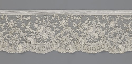 Lace fragment, lace with floral ornaments including rose flowers—some modeled in relief with petals