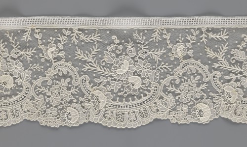 Lace fragment, lace with floral ornaments, rocaille motifs, over-stylized fan-shaped ribbons with