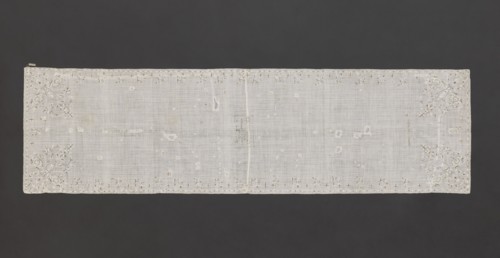 Church napkin. Napkin of white, thin, sparsely woven plain-weave batiste, embroidered with silk