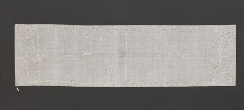 Church napkin. Napkin of white, thin, sparsely woven plain-weave batiste, embroidered with silk