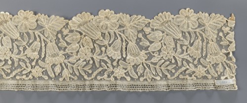 Lace fragment, floral ornaments; fragment of bobbin lace with relief edges made with a needle on a