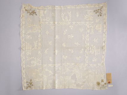 Tablecloth., Embroidered tablecloth: white embroidery on white mesh. In the center are projections