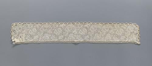 Fragment of bobbin lace with plant ornaments, 18th century, Flanders; width 7 cm, length 74 cm;