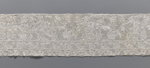 Lace fragment, bobbin lace Binche lace, 18th century. Background: mesh with large, rounded meshes.