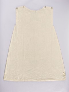 Two fragments of a dalmatic, front and back, of silk fabric interwoven with silver thread.