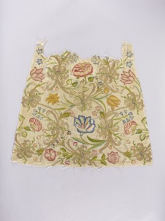 Two fragments of a dalmatic, embroidery on silk fabric interwoven with silver thread, front and