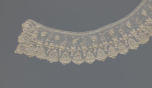 Collar, 19th century, France, band-style arched collar of equal width. Floral ornament set against