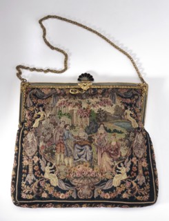 Women's handbag. Handbag in the shape of a rectangle, slightly narrowed at the top. Embroidered