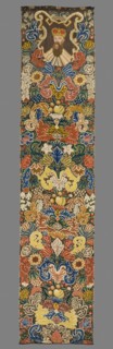 Tapestry embroidered in wool and silk on linen canvas. In the upper part, within a decorative