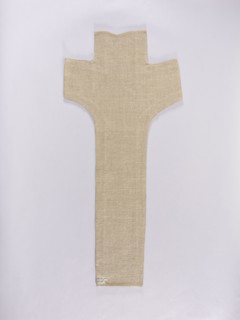 Embroidered Y-shaped chasuble pretext with a depiction of Christ on the cross, surrounded by a