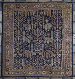 Carpet, The main field is filled with motifs of various species of trees arranged in three vertical