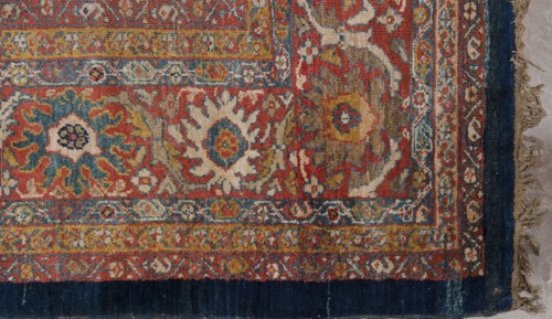 Carpet, The main field is filled with motifs of various species of trees arranged in three vertical