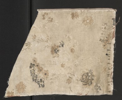 Fragment of fabric, silk fabric fragment with preserved selvedge, patterned floral design on a