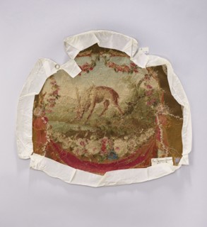 Tapestry covering, provenance, depiction of flowers, floral ornaments, and a deer. Decorative