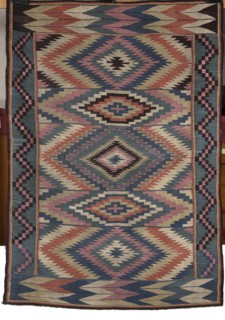 Kilim, Kilim with vertical stripes in rhombus motifs that merge concentrically into hexagons, their