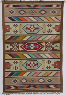 Kilim, The kilim is divided symmetrically into vertical stripes. The widest central stripe is