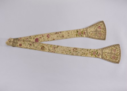 Stole, church paraments; white silk stole embroidered with a pattern of floral sprigs, without a