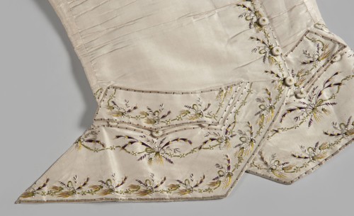 Men's waistcoat of cream silk, embroidered. Straight cut, without a collar; trapezoidally cut hems;