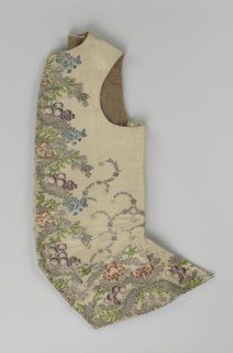 Vest, floral and plant ornaments, patterned fabrics. Predominant ornamental colors: silver, plum,
