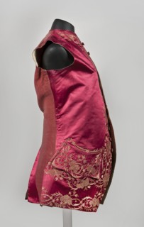 Men's vest made of cherry satin, embroidered. Straight cut, without sleeves or collar. Diagonal