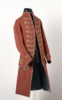 Habit à la française. Habit of pink cloth, embroidered with motifs imitating braiding, miniature