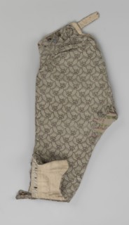 Short, knee-length men's trousers, sewn into a wide belt with a buttoned fly, made of silver lamé