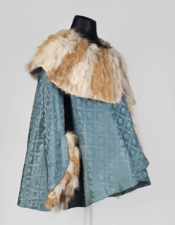 Jubka, long women's caftan jubka, hip-length, narrow in the shoulders, flared at the bottom. Large