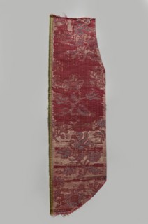 Fragment of fabric, silks, brocade, floral and plant patterns, double-warp brocade. On a white and