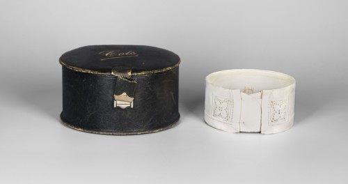 Women's collar, made of thin white linen, stiffened, decorated with openwork embroidery; edges on
